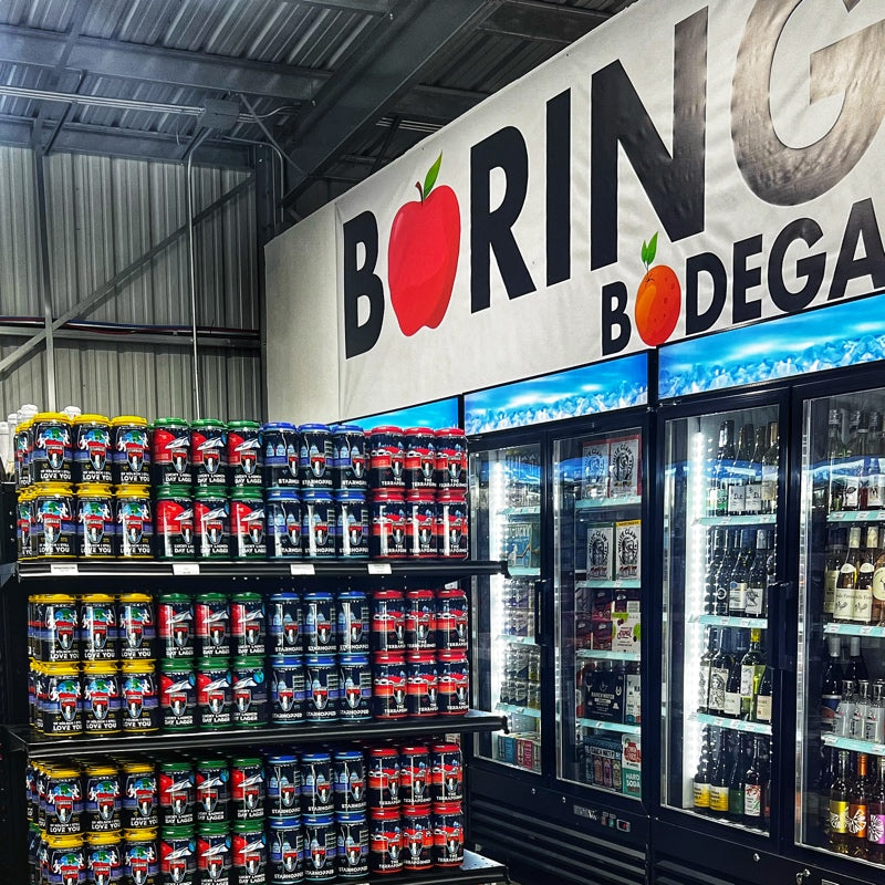 A full end cap display of Starbase Brewing beers at The Boring Company's Boring Bodega in Bastrop