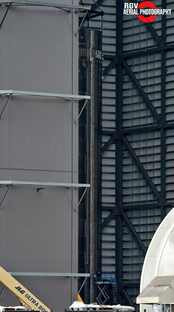 Booster 5 sits stacked in the High Bay at Starbase Texas