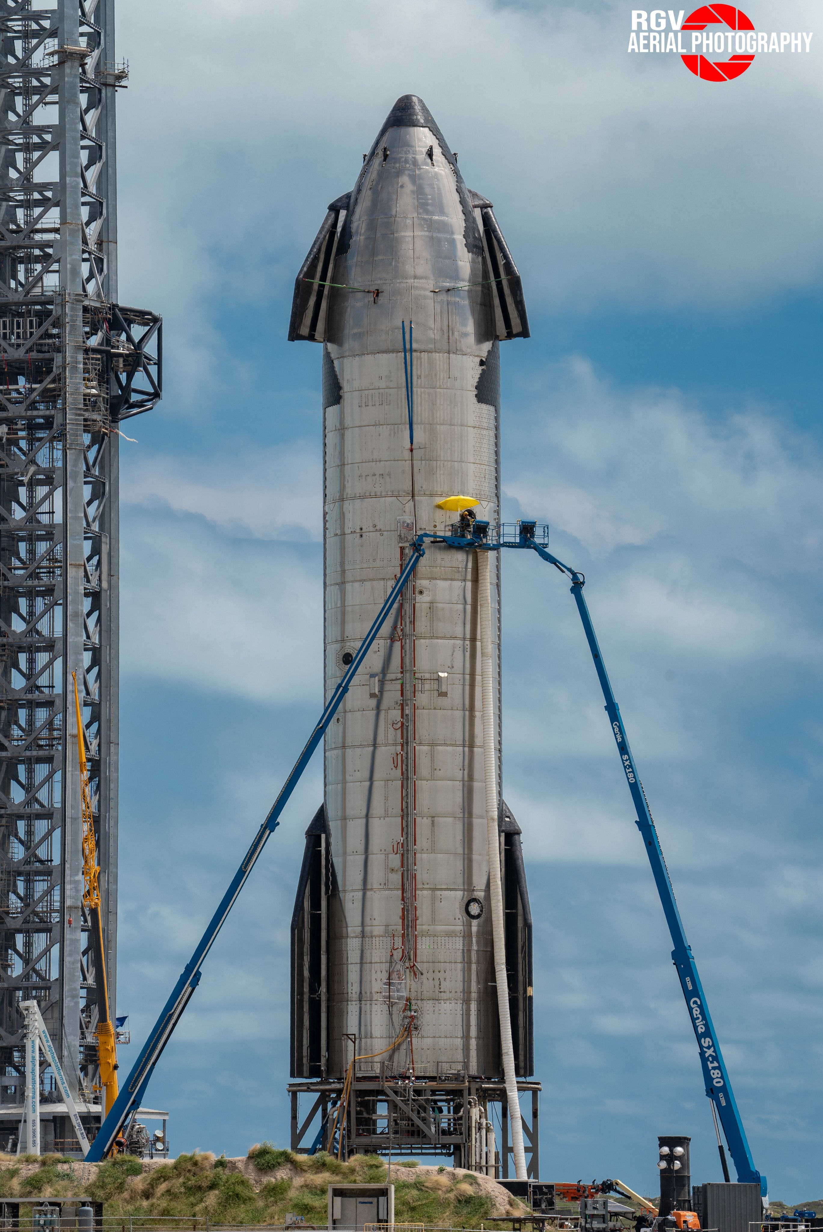 SpaceX employees working on Starship 20 at Starbase