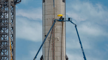 SpaceX employees working on Starship 20 at Starbase