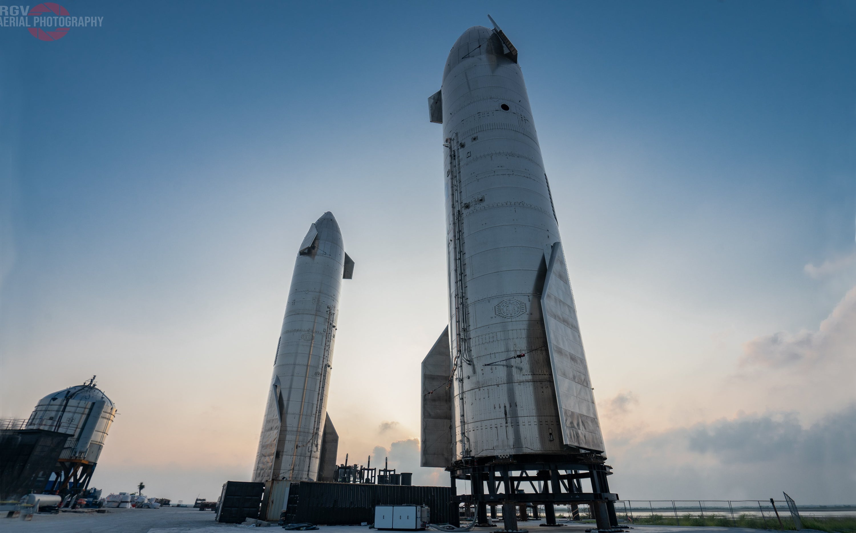 SpaceX Starships at Starbase Texas with the sun rising in the background