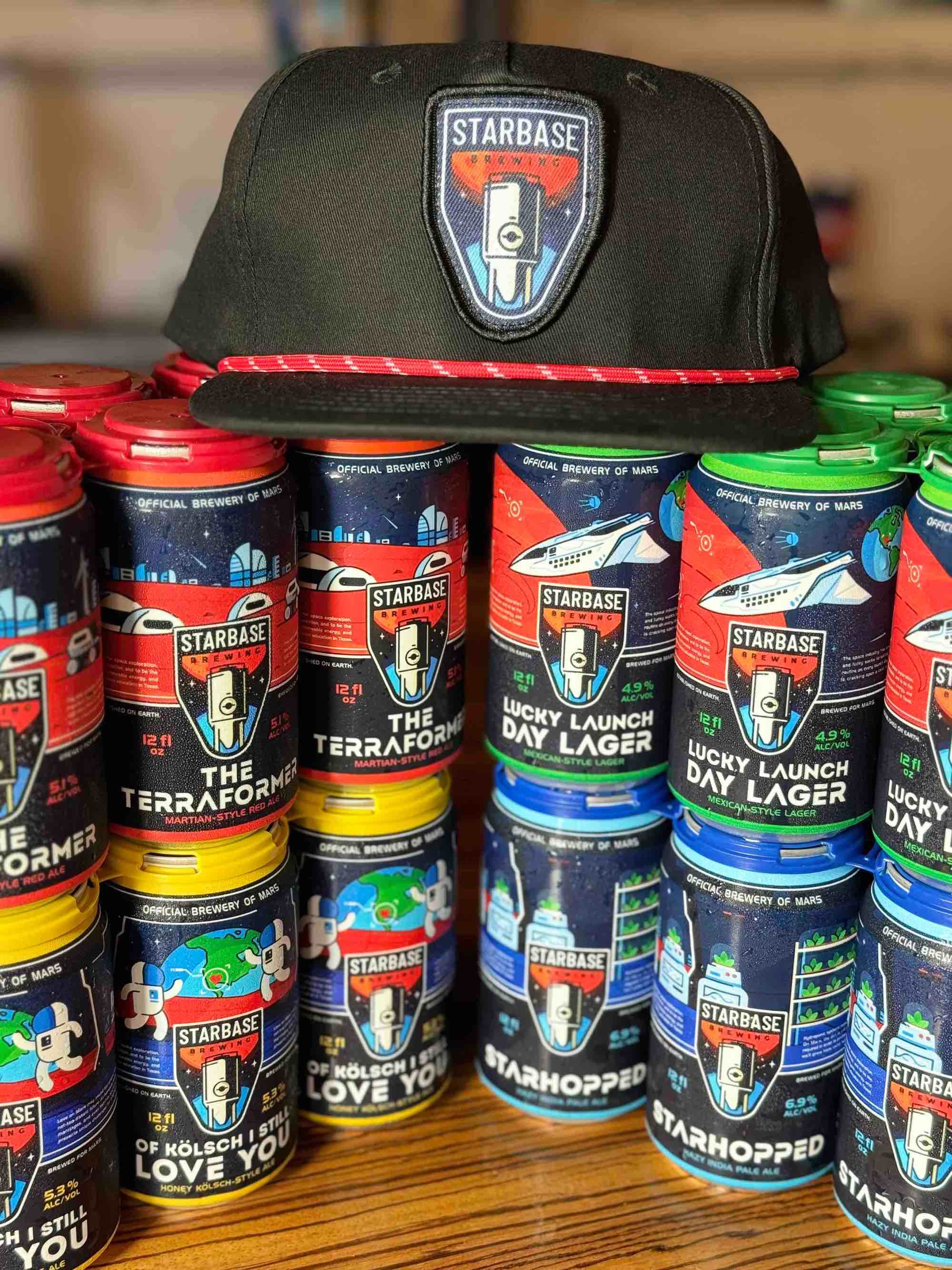 Multiple Starbase 6-packs stacked with a rope hat resting on top.
